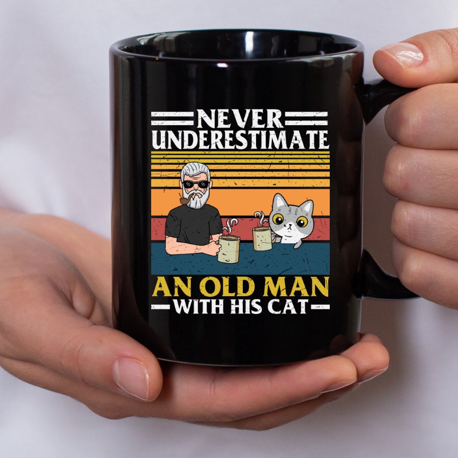 Never underestimate an old man and his cat! Funny Cat Dad Mug, Fur Dad Gift, Cat Present, Cat Dad Gift, Cat-Themed Gift, 11oz Black Mug